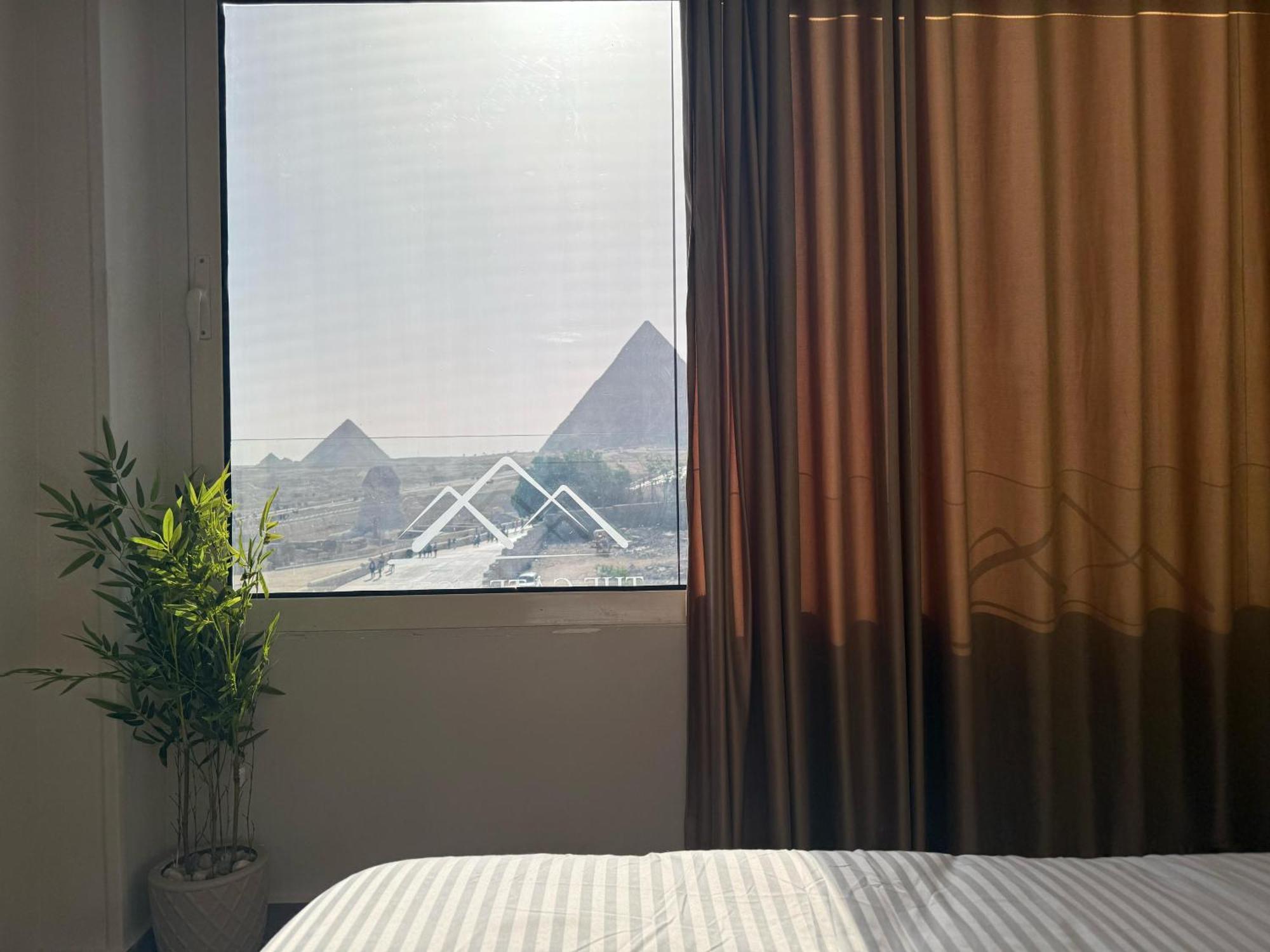 The Gate Hotel Front Pyramids & Sphinx View Kafrat al Jabal Exterior photo