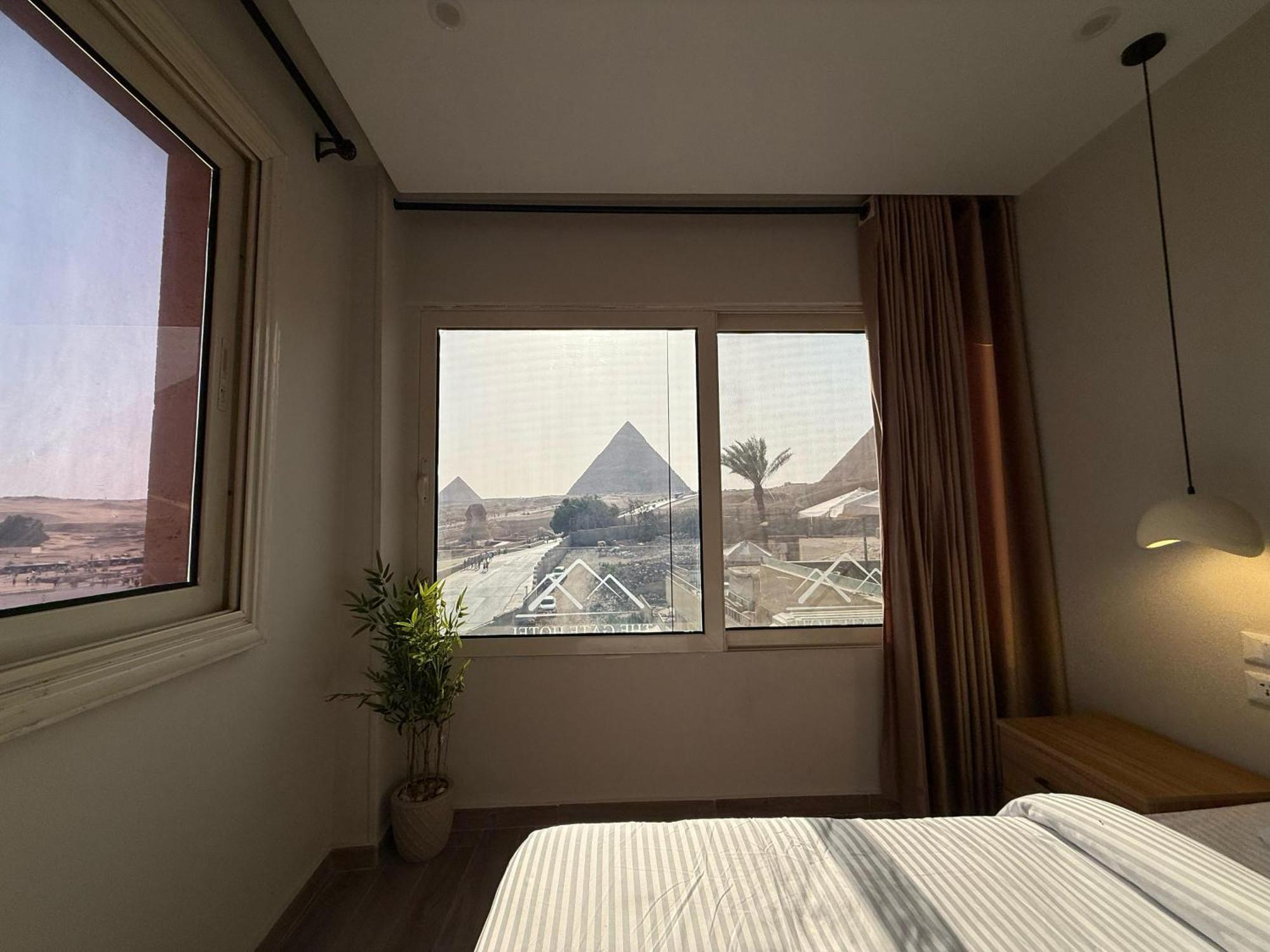 The Gate Hotel Front Pyramids & Sphinx View Kafrat al Jabal Exterior photo